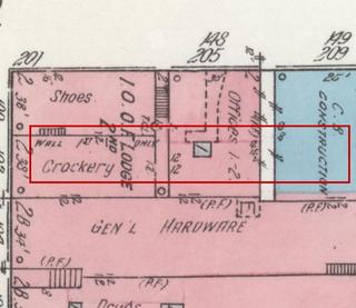 April 1914 Sanborn fire insurance map detail with the lot at today&rsquo;s 100 Elk Ave. S. (storefront 1 of 2) outlined in red; the map labels it: crockery