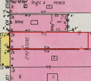September 1926 Sanborn fire insurance map detail with the lot at today&rsquo;s 110 Elk Ave. S. (storefront 5 of 5) outlined in red; the map labels it: one store, across two of the 1914 storefronts