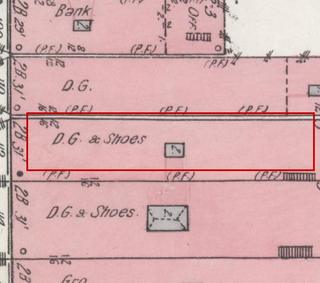 April 1914 Sanborn fire insurance map detail with the lot at today&rsquo;s 110 Elk Ave. S. (storefront 4 of 5) outlined in red; the map labels it: dry goods and shoes