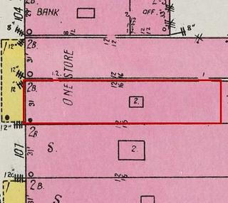 September 1926 Sanborn fire insurance map detail with the lot at today&rsquo;s 110 Elk Ave. S. (storefront 4 of 5) outlined in red; the map labels it: one store, across two of the 1914 storefronts