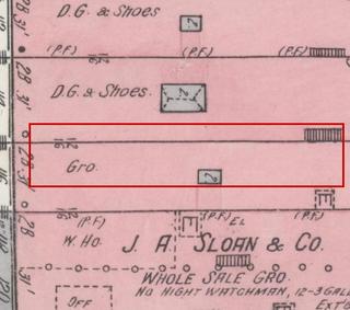 April 1914 Sanborn fire insurance map detail with the lot at today&rsquo;s 110 Elk Ave. S. (storefront 2 of 5) outlined in red; the map labels it: grocery