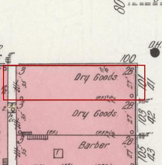 April 1914 Sanborn fire insurance map detail with the lot at today&rsquo;s 101 Main Ave. S. outlined in red; the map labels it: dry goods