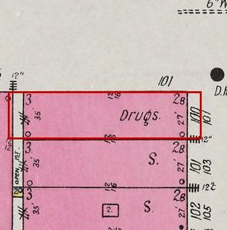 September 1926 Sanborn fire insurance map detail with the lot at today&rsquo;s 101 Main Ave. S. outlined in red; the map labels it: drugstore