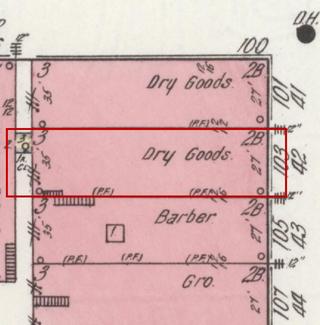 April 1914 Sanborn fire insurance map detail with the lot at today&rsquo;s 103 Main Ave. S. outlined in red; the map labels it: dry goods