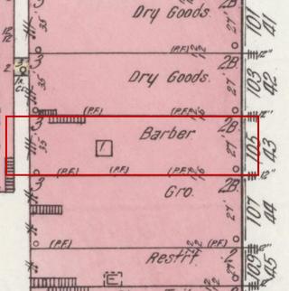 April 1914 Sanborn fire insurance map detail with the lot at today&rsquo;s 105 Main Ave. S. outlined in red; the map labels it: barber