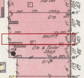 April 1914 Sanborn fire insurance map detail with the lot at today&rsquo;s 111 Main Ave. S. outlined in red; the map labels it: restaurant