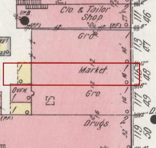 April 1914 Sanborn fire insurance map detail with the lot at today&rsquo;s 117 Main Ave. S. outlined in red; the map labels it: market